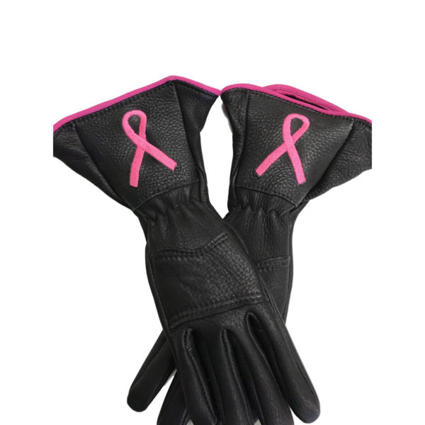 A pair of gloves with pink ribbon on them.